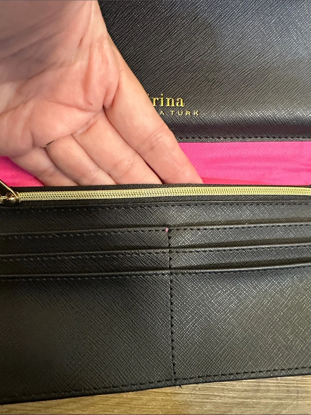Trina Turk pink, red, black and blue cross body clutch with gold tone chain
